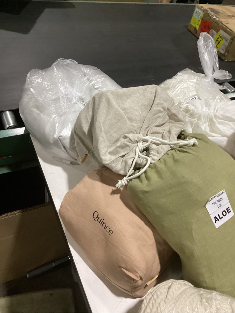 Condition photo showing As Is for **similar to** (various colors and patterns) quince duvet with shams full/queen