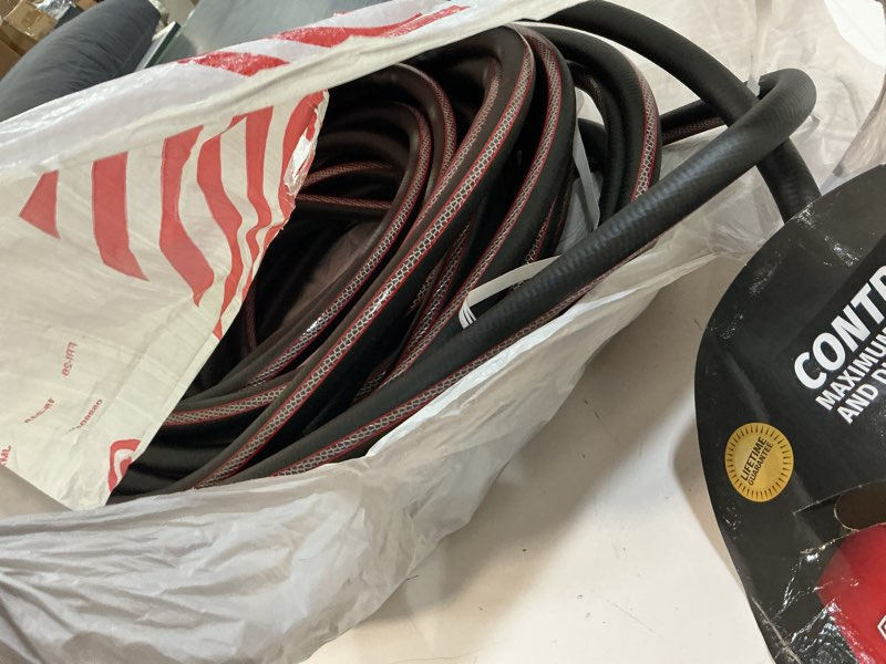 Condition photo showing As Is for neverkink max teknor apex 5/8-in x 100-ft contractor-duty kink free vinyl black coiled hose