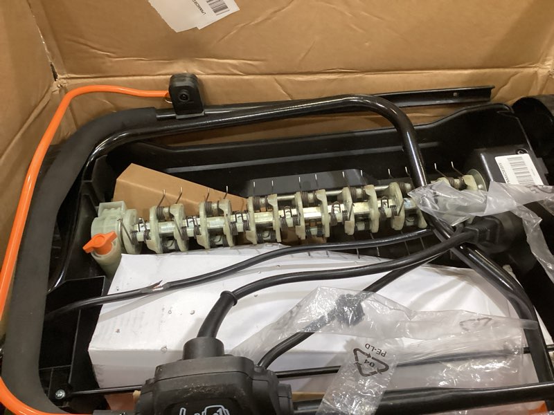 Condition photo showing As Is for lawnmaster gvb1316 electric 16” 13 amp dethatcher and scarifier with 12 gallon collection bag electric 16-inch