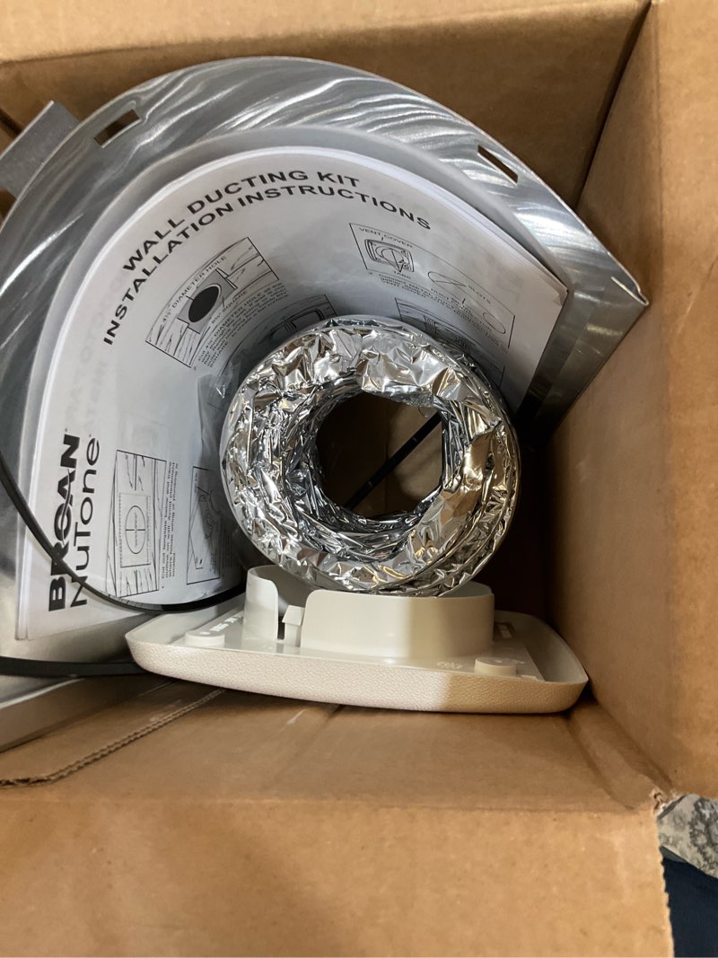 Condition photo showing As Is for broan-nutone 6.5 in. w x 6.5 in. l white resin wall ducting kit