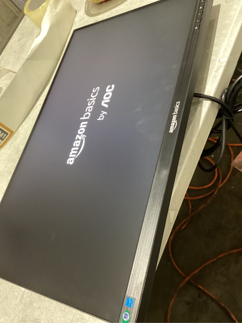 Condition photo showing As Is for (missing cords)amazon basics 24-inch full hd ips monitor, 75 hz, 1080p, hdmi, display port and vga input, adjustable stand, vesa compatible, built-in speakers for office and home, black