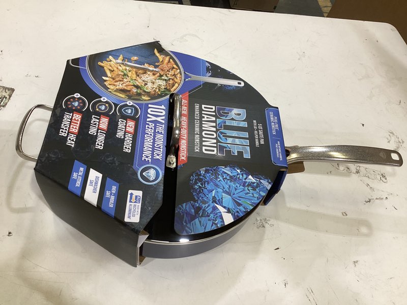 Condition photo showing New/Like New for blue diamond 5qt saute pan with lid, non toxic pfas-free diamond ceramic nonstick, dishwasher & oven safe, metal utensil safe, deep jumbo cooker skillet with helper handle, glass lid, blue blue 5 quart saute pan with lid