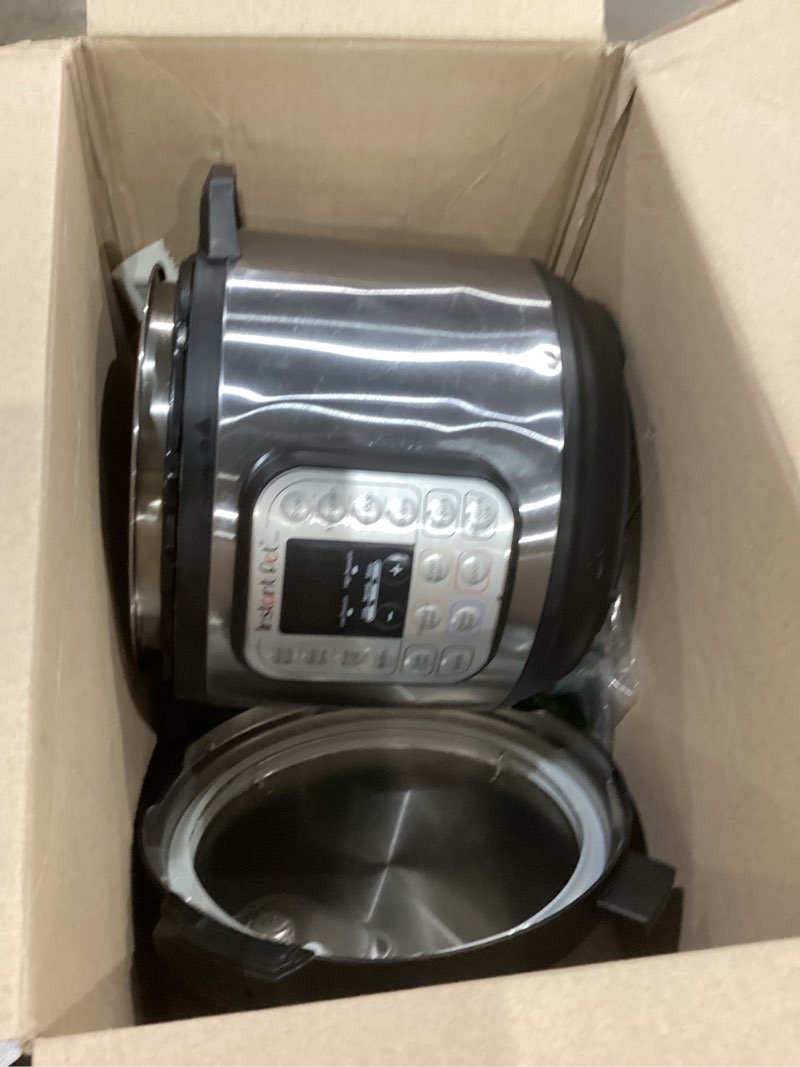 Condition photo showing As Is for instant pot duo 7-in-1 electric pressure cooker, slow cooker, rice cooker, steamer, sauté, yogurt maker, warmer & sterilizer, includes app with over 800 recipes, stainless steel, 8 quart 8 quarts