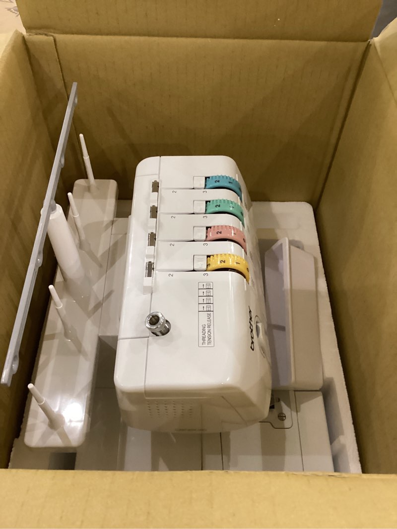 Condition photo showing Good Condition for Brother Serger, 1034D, Heavy-Duty Metal Frame Overlock Machine, 1,300 Stitches Per Minute, Removeable Trim Trap, 3 Included Accessory Feet, White