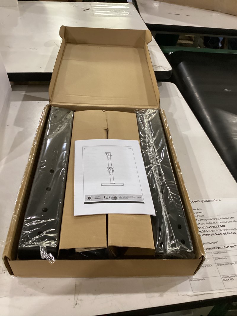 Condition photo showing Good Condition for vertical dual monitor stand for 13-32 inch monitors, no clamp, freestanding | supports 44 lbs/arm | tempered glass base | ±25° swivel | -5° to +10° tilt | 8 height options | vesa 75×75/100×100 mm