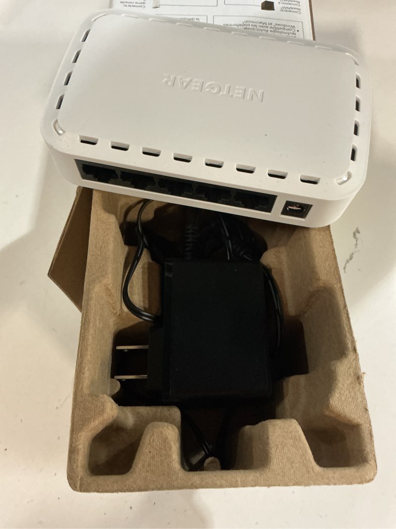 Condition photo showing Good Condition for 5-port gigabit ethernet home/office network unmanaged switch