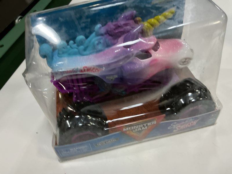 Condition photo showing Good Condition for monster jam, official sparkle smash monster truck, collector die-cast vehicle, 1:24 scale