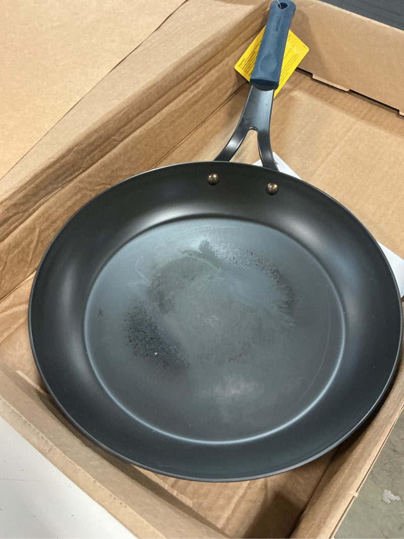 Condition photo showing As Is for tramontina carbon steel 12-inch large frying pan with silicone grip, naturally non stick skillet, oven safe