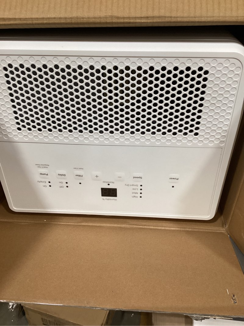 Condition photo showing As Is for ge portable dehumidifier, 50 pint daily output with built-in pump and smart dry for wet spaces auto or manual drainage, ultra quiet, perfect for basement, bedroom, bathrooms, white 50 pint - pump