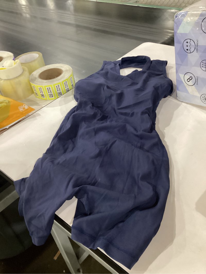 Condition photo showing Good Condition for yeoreo backless workout jumpsuits women one piece sleeveless jumpsuit with pads tessia scrunch butt yoga romper regular small navy
