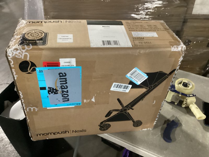 Condition photo showing New/Like New for mompush nexis carbon travel stroller, ultra-lightweight 11.5 lbs, compact & airplane carry-on approved, one-second auto-fold, one-hand full recline, from birth to 50 lbs, jpma certified
