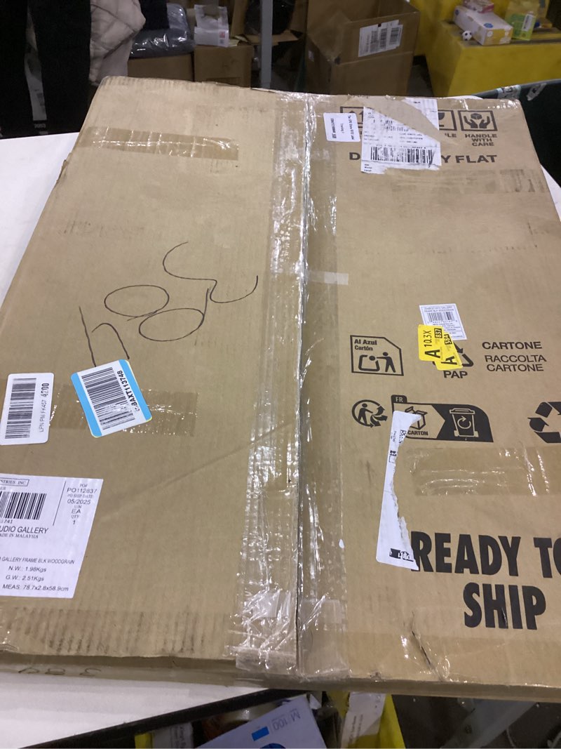 Condition photo showing Good Condition for MCS Studio Gallery 20x28 Poster Frame Black Woodgrain, Vertical & Horizontal Wall Hanging Large Picture Frame for Photos, Posters & Art Prints (1-Pack)