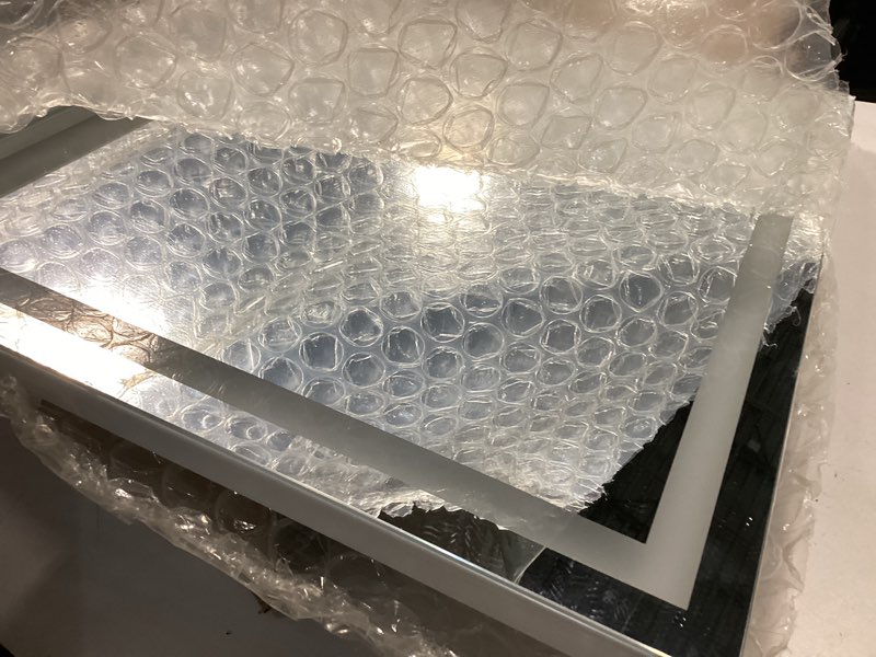 Condition photo showing As Is for ROLOVE 22x19 Inch Lighted Vanity Mirror, Large LED Makeup Mirror with 3 Color Modes, Dimmable Touch Control, Wall Mount & Tabletop, with Detachable 10X Magnification Mirror, White White 22"L x 19"W