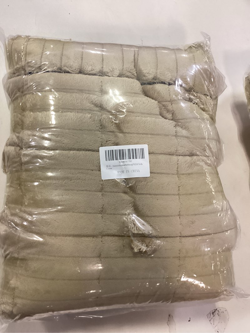 Condition photo showing New/Like New for Plush Sofa Cover Washable, Cozy and Soft Faux Fur Couch Covers, Non Slip Fuzzy Furry Sofa Mats for Babies Pets(Khaki/28x82 in/4-Seater Sofa Cover) 1PC/28"x82"/4-Seaters Cream