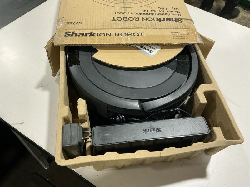 Condition photo showing As Is for Shark AV753 ION Robot Vacuum, Tri-Brush System, Wifi Connected, 120 Min Runtime, Works with Alexa, Multi Surface Cleaning, Grey ION Robot (Grey)