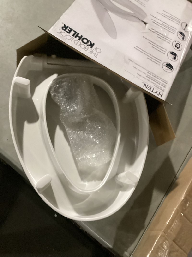 Condition photo showing Good Condition for kohler 25875-0 hyten 3" height, elevated soft close elongated toilet seat, contoured seat with grip-