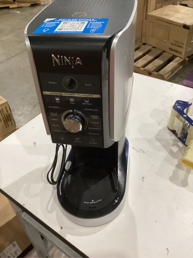 Condition photo showing As Is for ninja creami deluxe ice cream maker, treats and frozen desserts, sorbet, milkshakes, yogurt and more, 11-in-1 programs, xl capacity, includes two 24-oz family-size tubs, silver, nc501