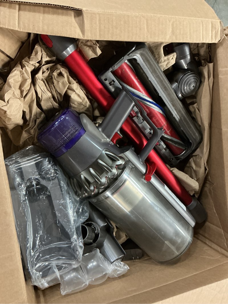 Condition photo showing As Is for Dyson Outsize Origin Cordless Vacuum, Nickel/Red