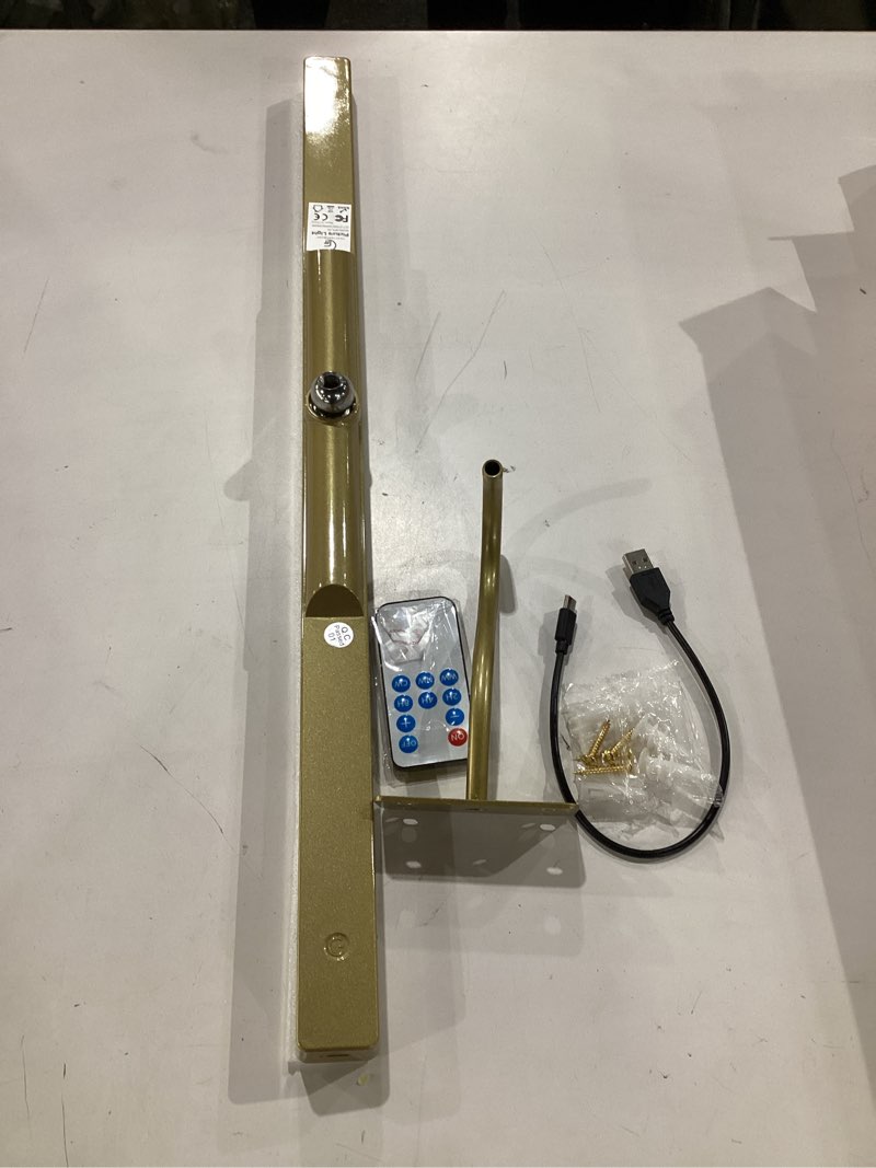 Condition photo showing As Is for 24 inch picture light for wall - battery operated wireless wall sconce with remote & timer for artwork, portrait, photo & frame (antque gold) antique gold 24in-1pack