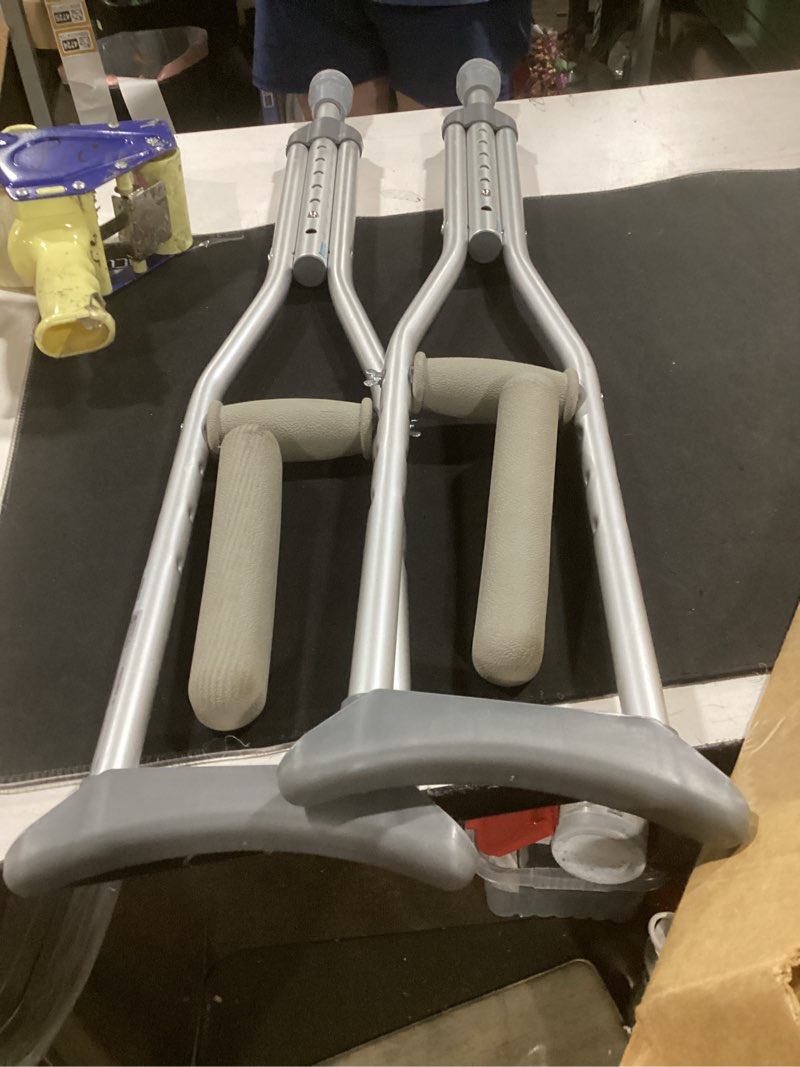 Condition photo showing As Is for dynarex adjustable aluminum crutches, child
