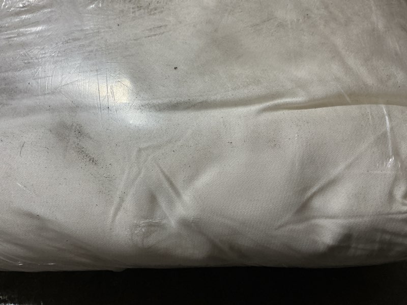 Condition photo showing As Is for bamboo sheet set, calking, ivory