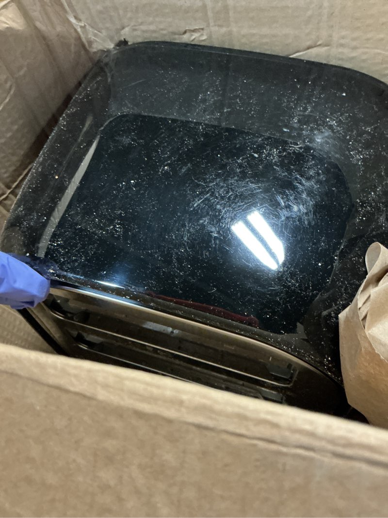 Condition photo showing As Is for black+decker 4-slice toaster, extra wide slots, 7 shade settings, 1400 watts, frozen and bagel buttons, toast shade selector, extra lift 4-slice black