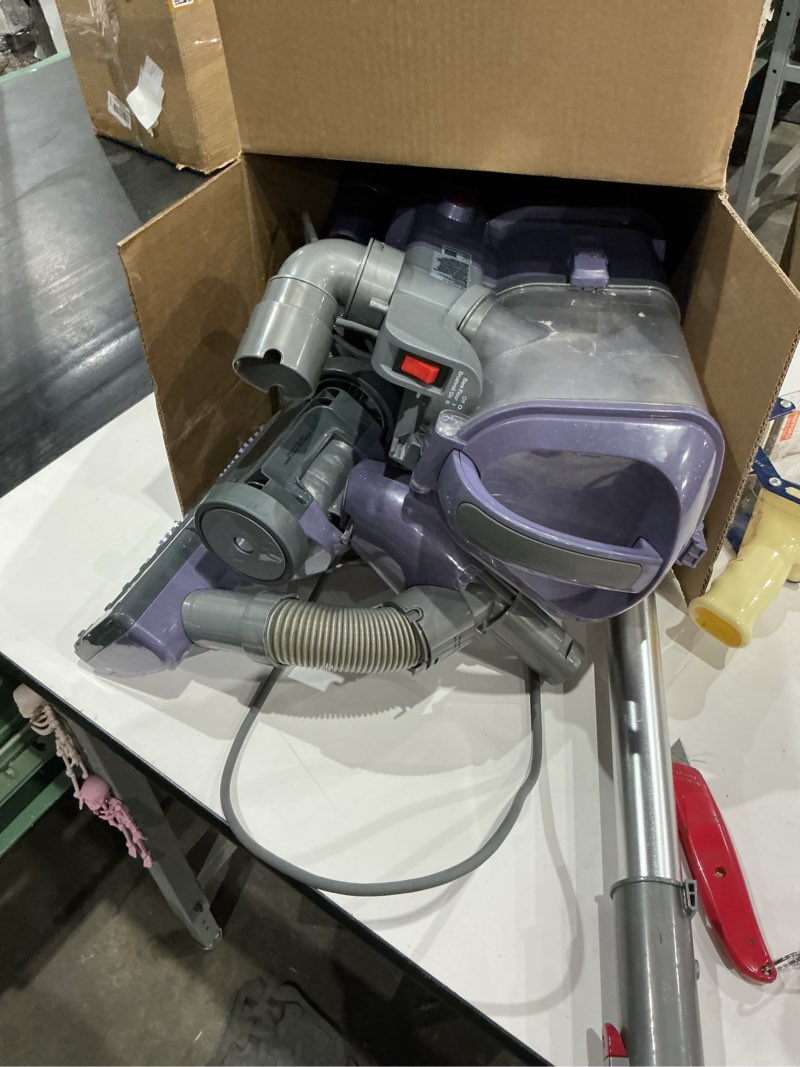 Condition photo showing As Is for shark nv352 navigator lift away upright vacuum, hepa filter, anti-allergen technology, swivel steering, ideal for carpet, stairs, & bare floors, with wide upholstery & crevice tools, lavender navigator (lavender)