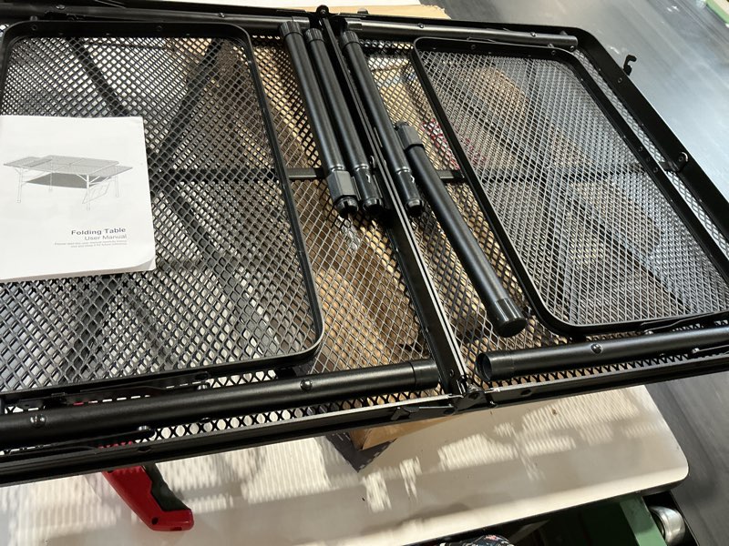 Condition photo showing Good Condition for wildfinder folding table with 2 wing panels, 3x2 ft camping table with mesh desktop,height adjustable folding grill table with mesh bag,portable outdoor table for picnic,camping,bbq,beach(black) 3x2ft with 2 panels