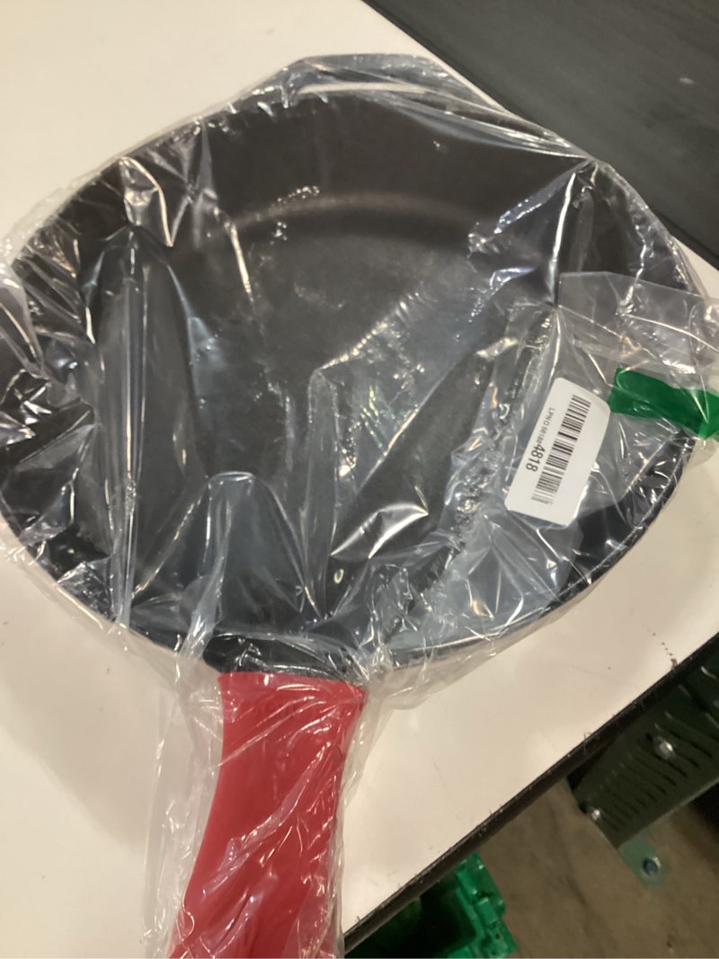 Condition photo showing New/Like New for lodge seasoned cast iron skillet 12 inches - quality frying pan for the stove, oven, grill & campfire - includes silicone hot handle holder - non-toxic, nonstick & long-lasting 12 inch + hot handle holder