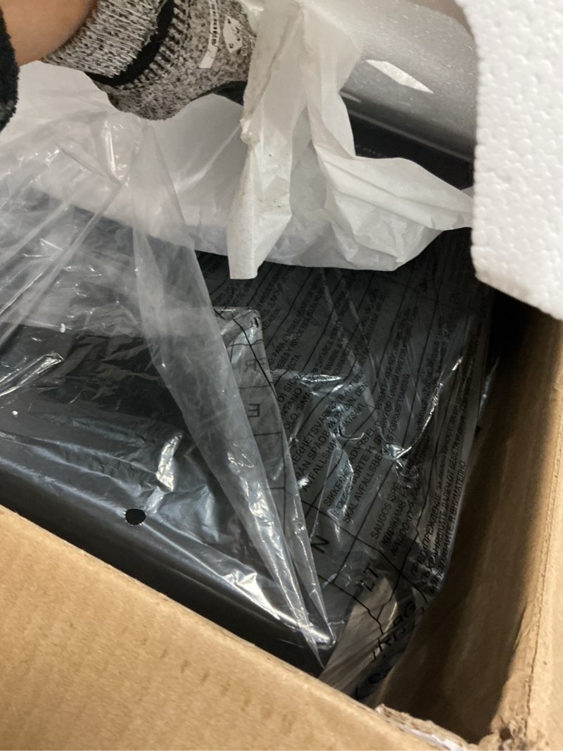 Condition photo showing Good Condition for Farberware 0.7 Cu. Ft. Countertop Microwave Oven – 700 Watts Power, Auto Cook Settings, Defrost, Easy Clean and Child Safety Lock - Stainless 0.7 Cu. Ft. Stainless Steel