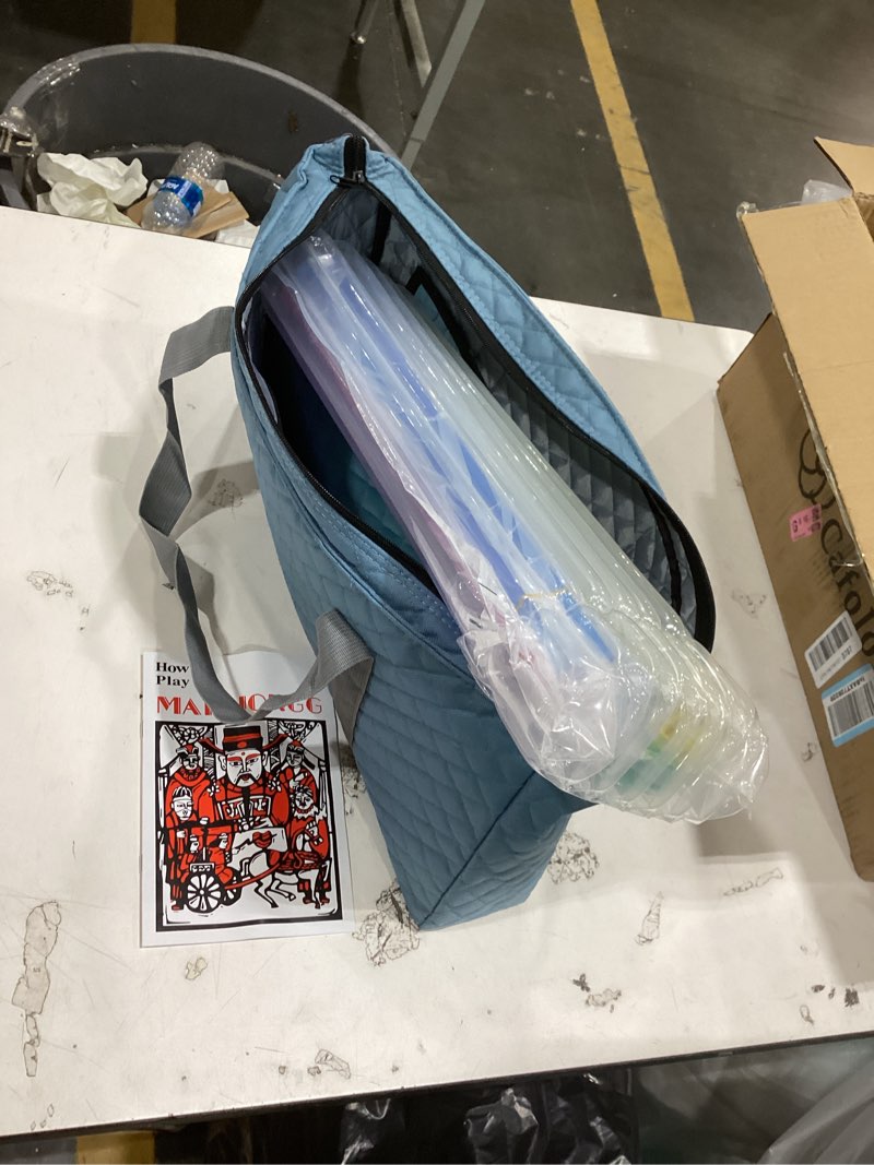 this item is a padded mahjong storage bag set designed to carry a complete set of tiles, racks, and accessories.  