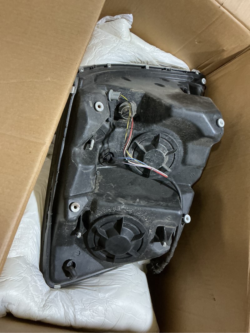 Condition photo showing As Is for black headlight headlights compatible with 2004-2017 volvo vnl 670 780,passenger right side lamp assembly