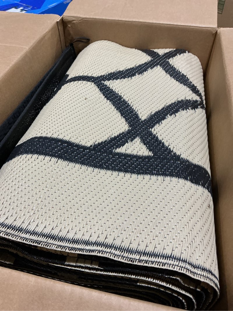 Condition photo showing Good Condition for (not sure of size) olanly waterproof outdoor rug 8x10 ft clearance, reversible outdoor plastic straw rug, rv mat, indoor outdoor carpet for patio, camping, balcony, deck, backyard, black & beige black & beige chevron 8' x 10' (rectangular)
