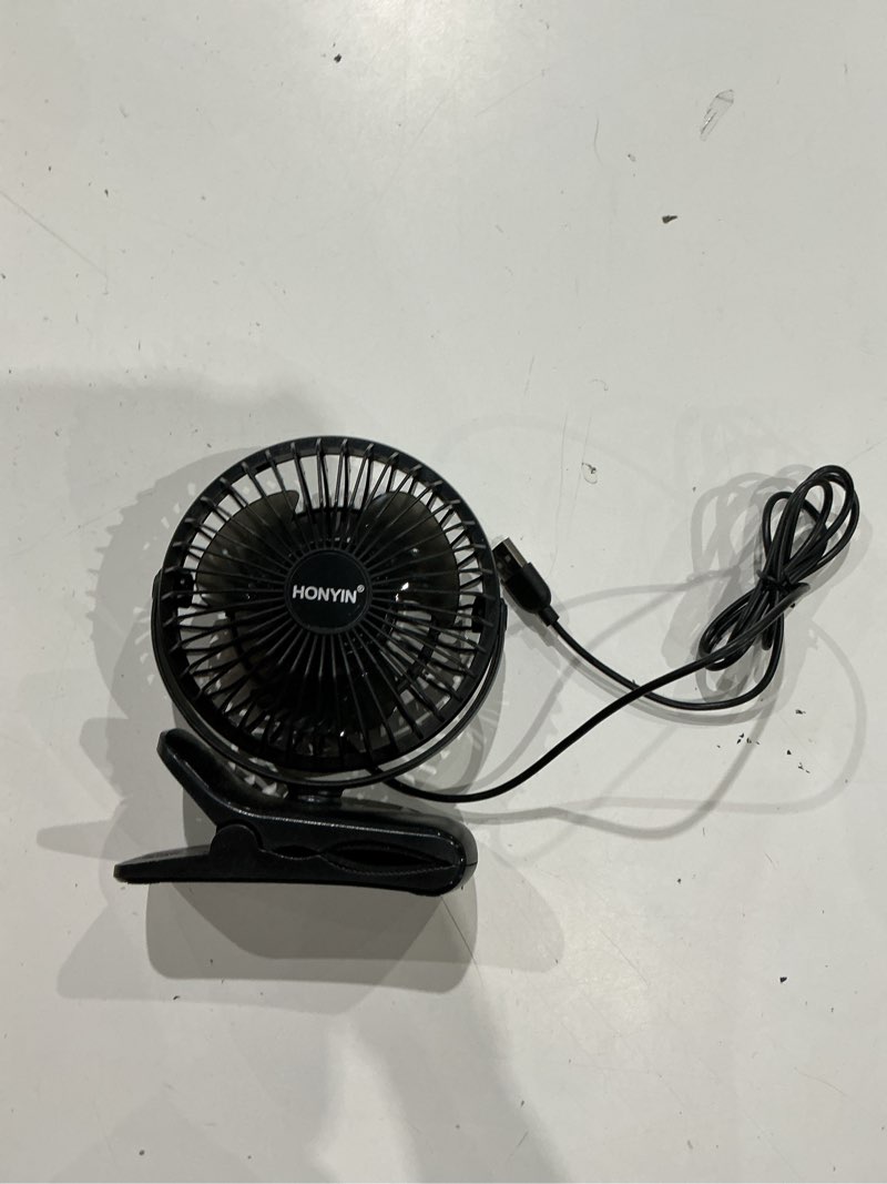 Condition photo showing As Is for honyin 720° rotation small desk & clip on fan with sturdy clamp, 3 speeds, quiet little personal cooling fan by usb plug in, for bedroom office desktop treadmill black
