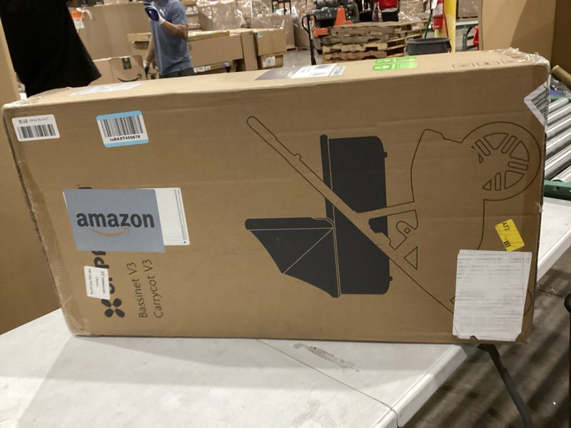 Condition photo showing New/Like New for uppababy bassinet v3 - compatible with vista, cruz, ridge strollers - overnight sleep solution - mattress, sheet and bug shield included - owen (mocha mélange) owen (mocha melange/carbon frame)