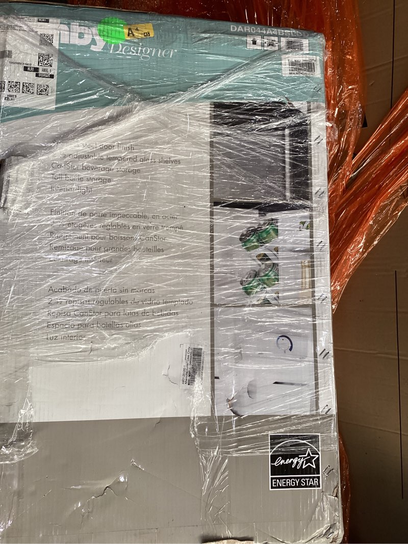 Condition photo showing As Is for danby dar044a4bsldd 4.4 cu. ft. compact fridge in stainless steel
