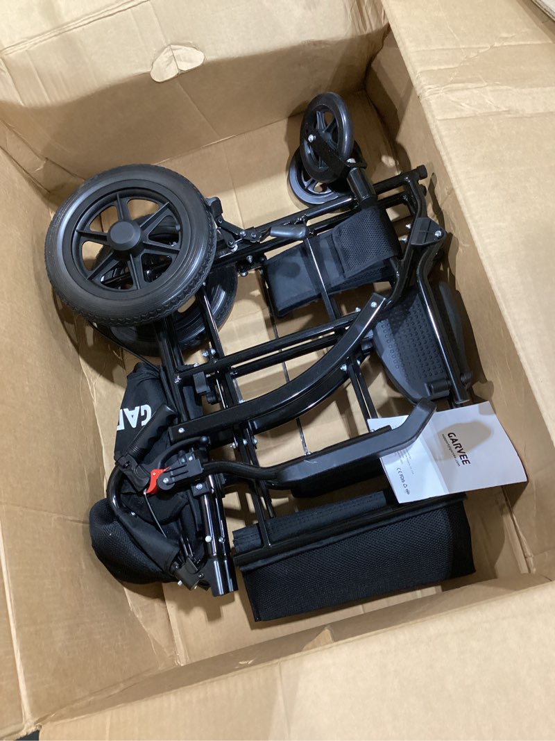 Condition photo showing Good Condition for garvee lightweight transport wheelchair, 28.7 lbs aluminum folding chair | hydraulic lift 180° split seat flip-back armrests swing-away footrests folding transport design black alloy