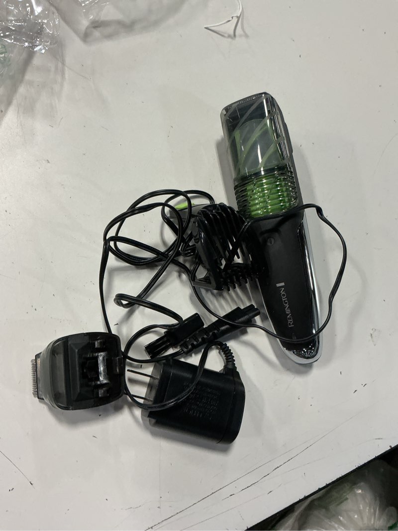 Condition photo showing As Is for remington vacuum beard trimmer,13 length and style settings with adjustable length comb (2-18mm),vacuum trimmer for beard, mustache, and stubble, rechargeable lithium power, washable, removable blades 2 piece set black/green