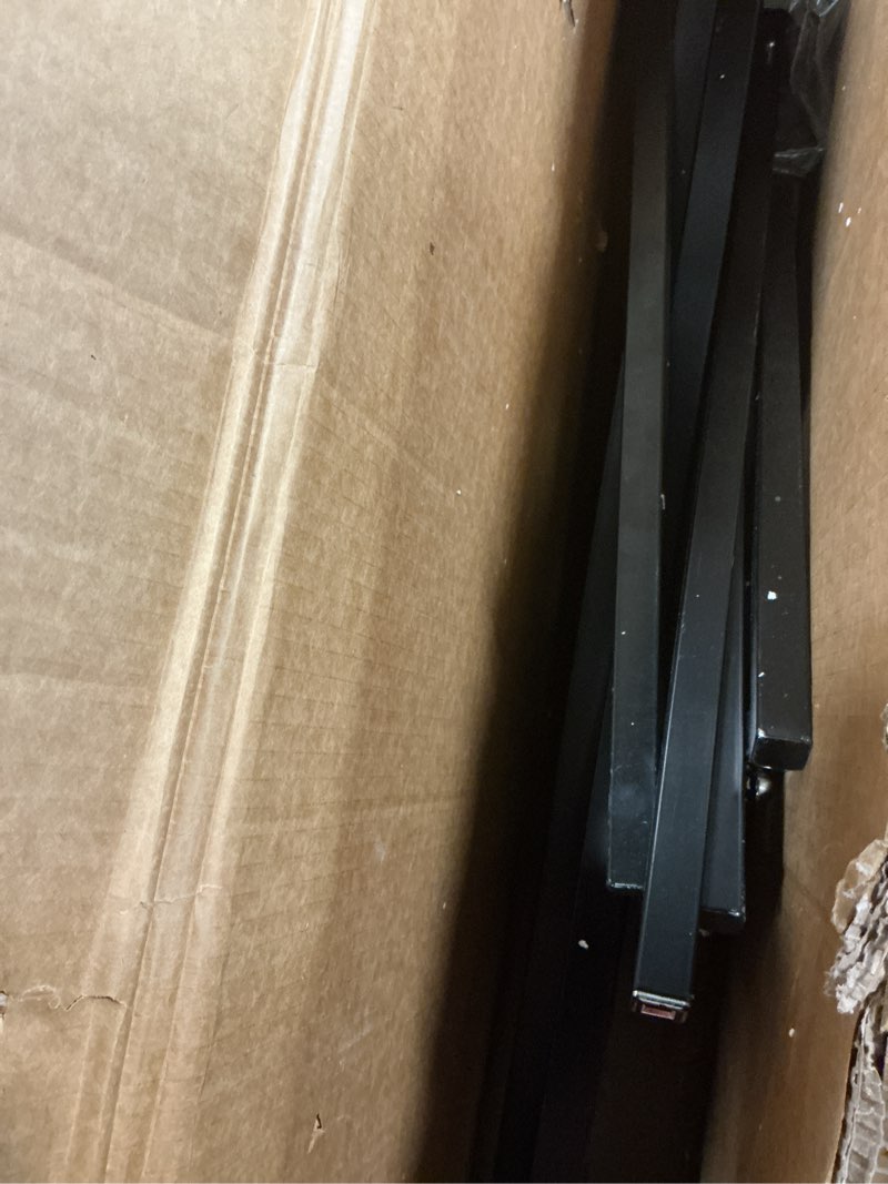 Condition photo showing As Is for SSWBasics Black 4 Way Adjustable Clothing Rack with Slanted Arms - Retail Clothing Rack Display - Adjustable Height Arms from 48" to 72" Perfect for Clothing Stores