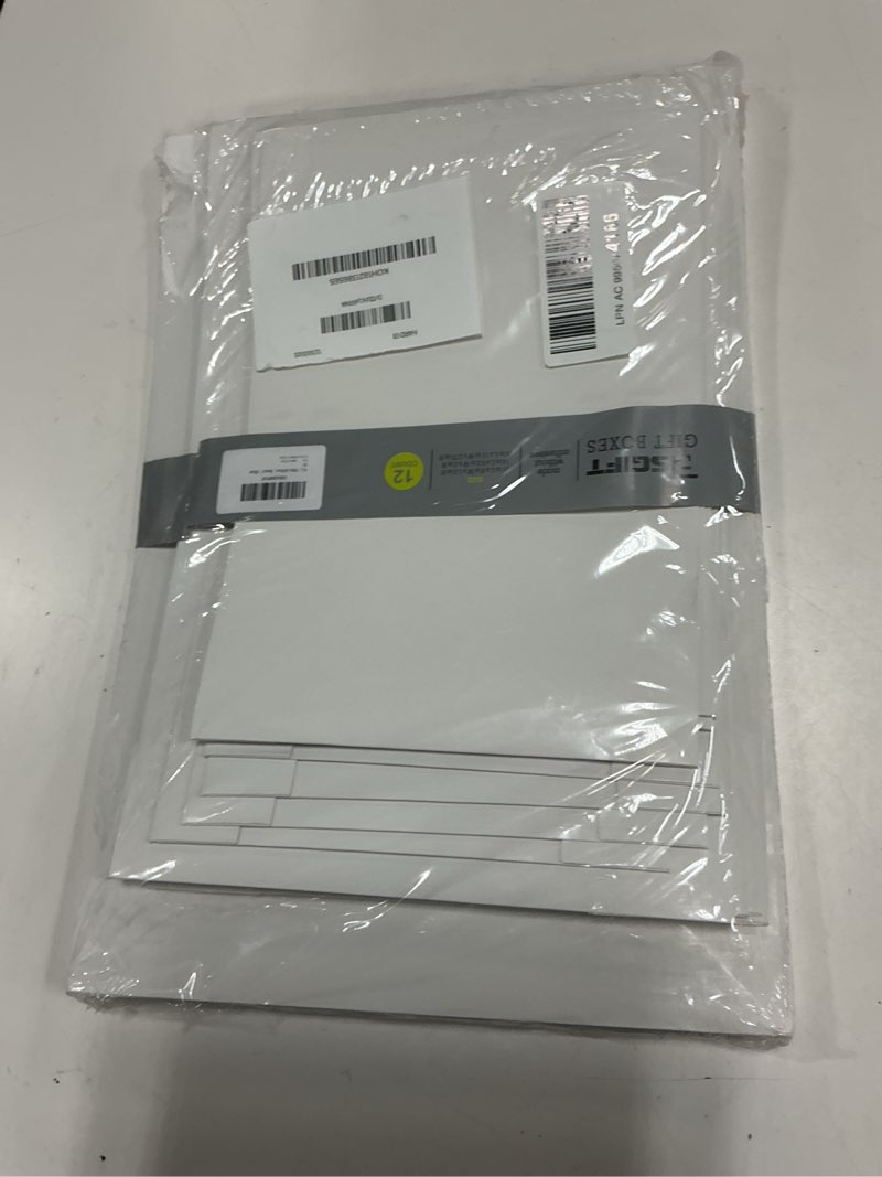 Condition photo showing New/Like New for rsgift white gift boxes,assorted sizes (4 boxes each: 11", 14", 16") for clothing,books,dvds & more-perfect for birthdays,weddings,christmas & other occasions