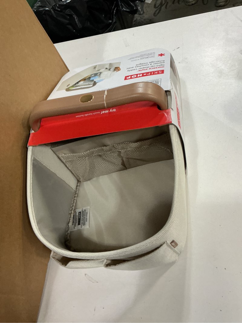 Condition photo showing New/Like New for Skip Hop Diaper Caddy Organizer with Touch Sensor Night Light Nursery Style Oat Light-Up Diaper Caddy Oat