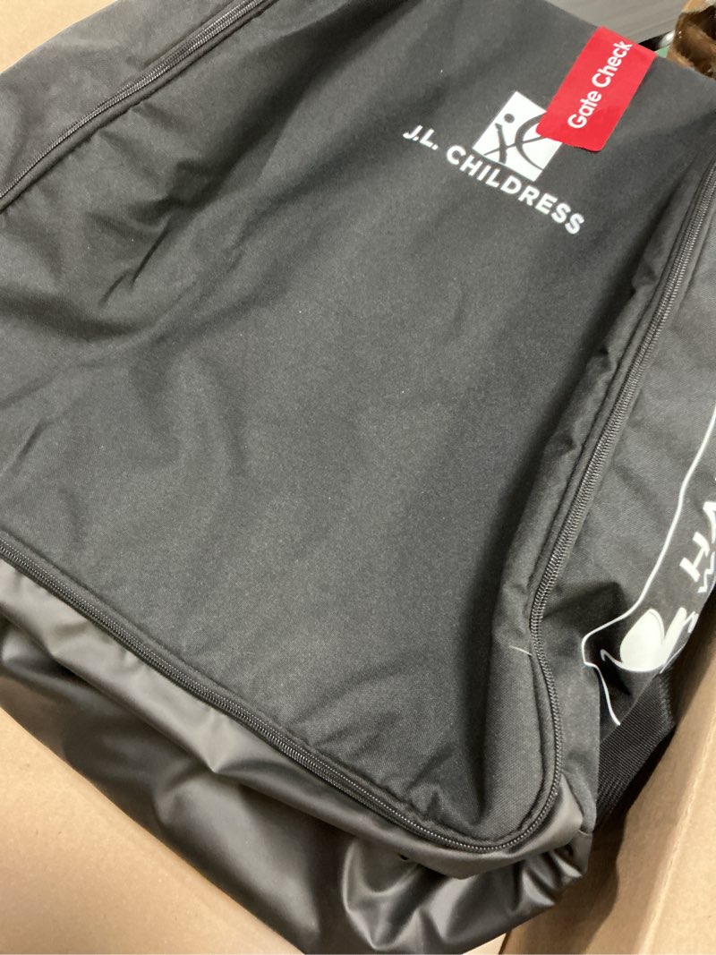 Condition photo showing Good Condition for l. childress padded compact travel stroller bag for airplane - fits most compact-fold single baby strollers, airtag compatible, black, expands from 21"w x 23"h x 7"d to 21"w x 23"h x 11"d