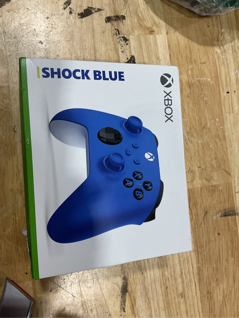 Condition photo showing New/Like New for xbox wireless gaming controller | shock blue | console, pc, & android | textured grip | wireless, bluetooth, usb-c connectivity