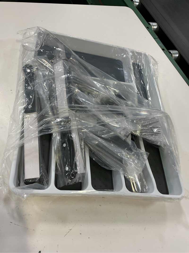 Condition photo showing New/Like New for 49-piece silverware set with organizer, heavy duty stainless steel flatware set for 8, cutlery utensil sets with steak knives, rust-proof, mirror polished, dishwasher safe, heavy duty