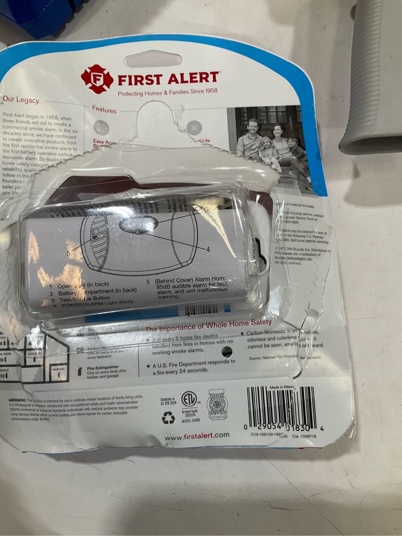 Condition photo showing As Is for basic co alarm w/ 9v battery