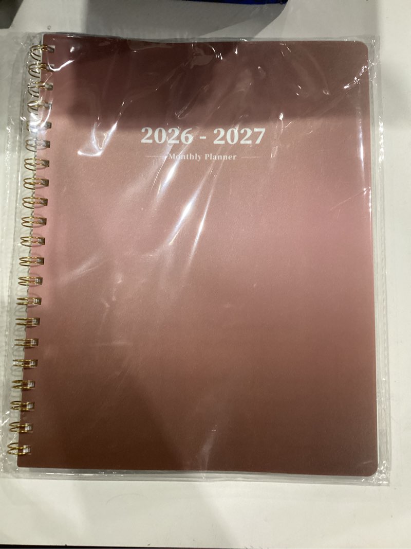 Condition photo showing New/Like New for Ymumuda 2026 Monthly Planner - 2 Year Monthly Planner, JAN.2026 to DEC.2027, 8.5" x 11", Large Calendar with Spiral Bound, 24 Coated Tabs,24 Months Perfect for School & Office Schedule, Rose Gold