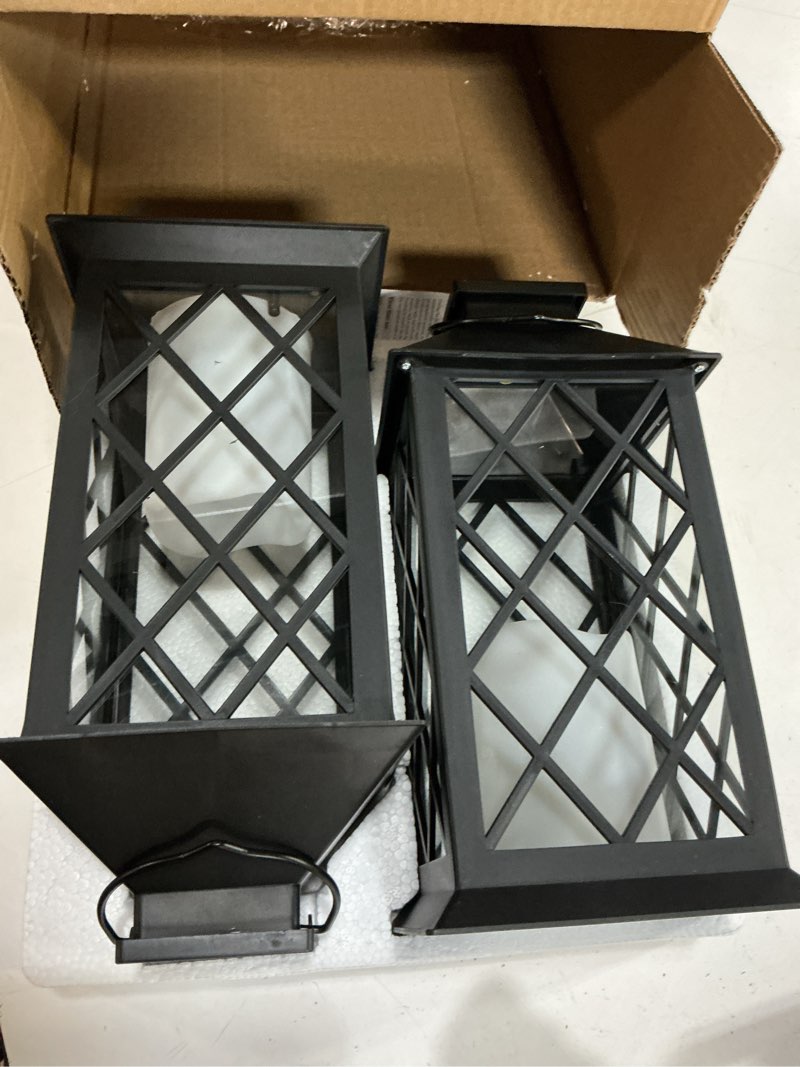 Condition photo showing New/Like New for homemory solar lanterns outdoor waterproof hanging with flickering flameless candles, 2 pack 13'' garden outdoor lantern decorative for patio front porch backyard balcony cabin outside table(black)