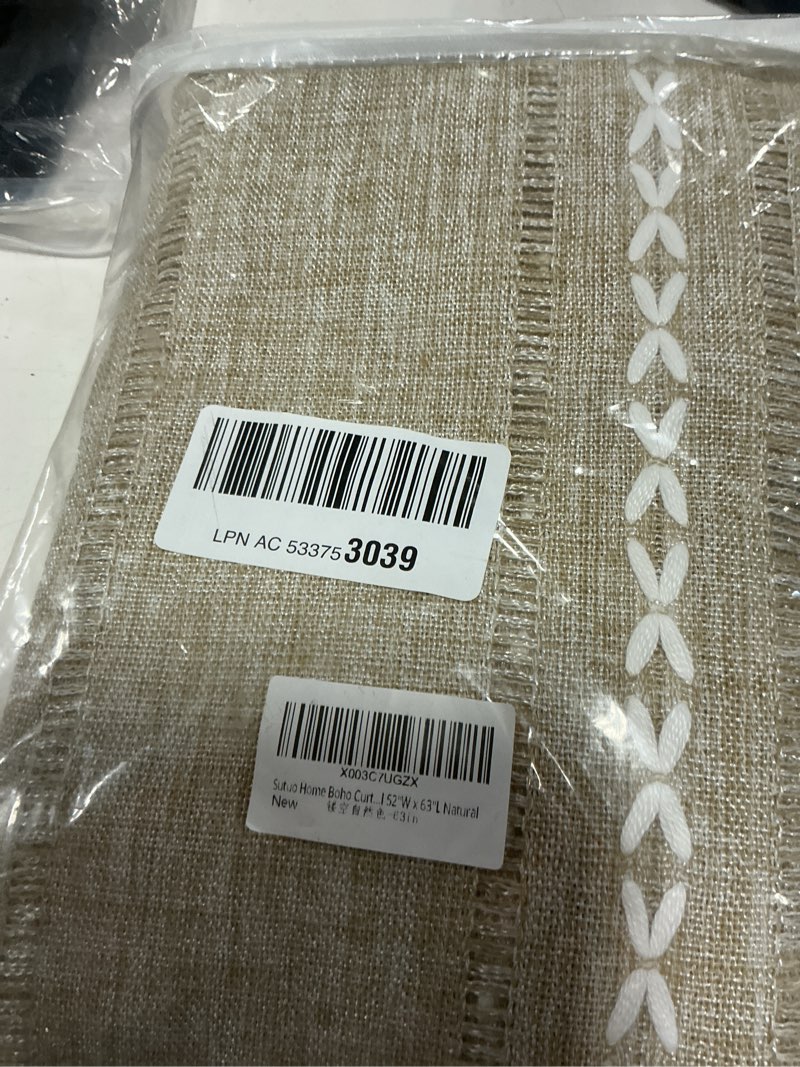 Condition photo showing New/Like New for sutuo home boho curtains for bedroom living room 63 inch length, light filtering french country farmhouse vintage shabby chic tassels hollow window treatment bohemian drape 1 panel 52"w x 63"l natural