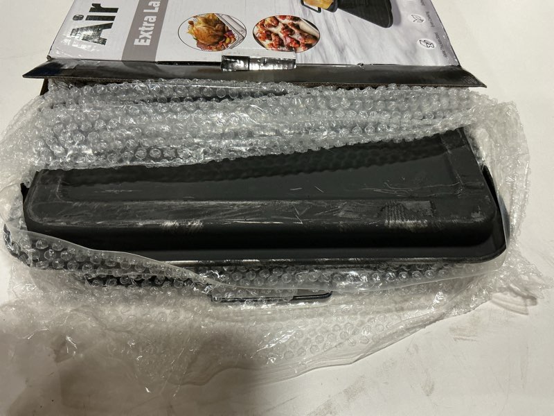 Condition photo showing As Is for Air Fryer Basket for Oven, Extra Large 18.8" x 12.8" Oven Air Fryer Basket and Tray Set with 30 PCS Parchment Papers, DEGOVIN Stainless Steel Oven Pan and Crisper Tray (Black) BLACK- XL SET