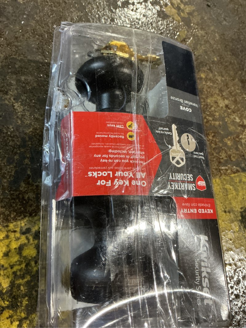 Condition photo showing As Is for kwikset smartkey security cove venetian bronze entry door knob kw1 2-3/4 in.